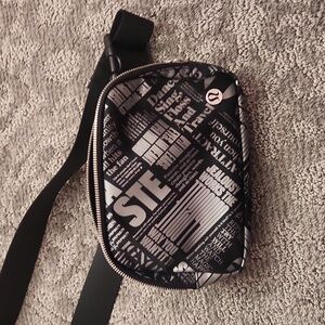 Lululemon belt bag “Manifesto” print